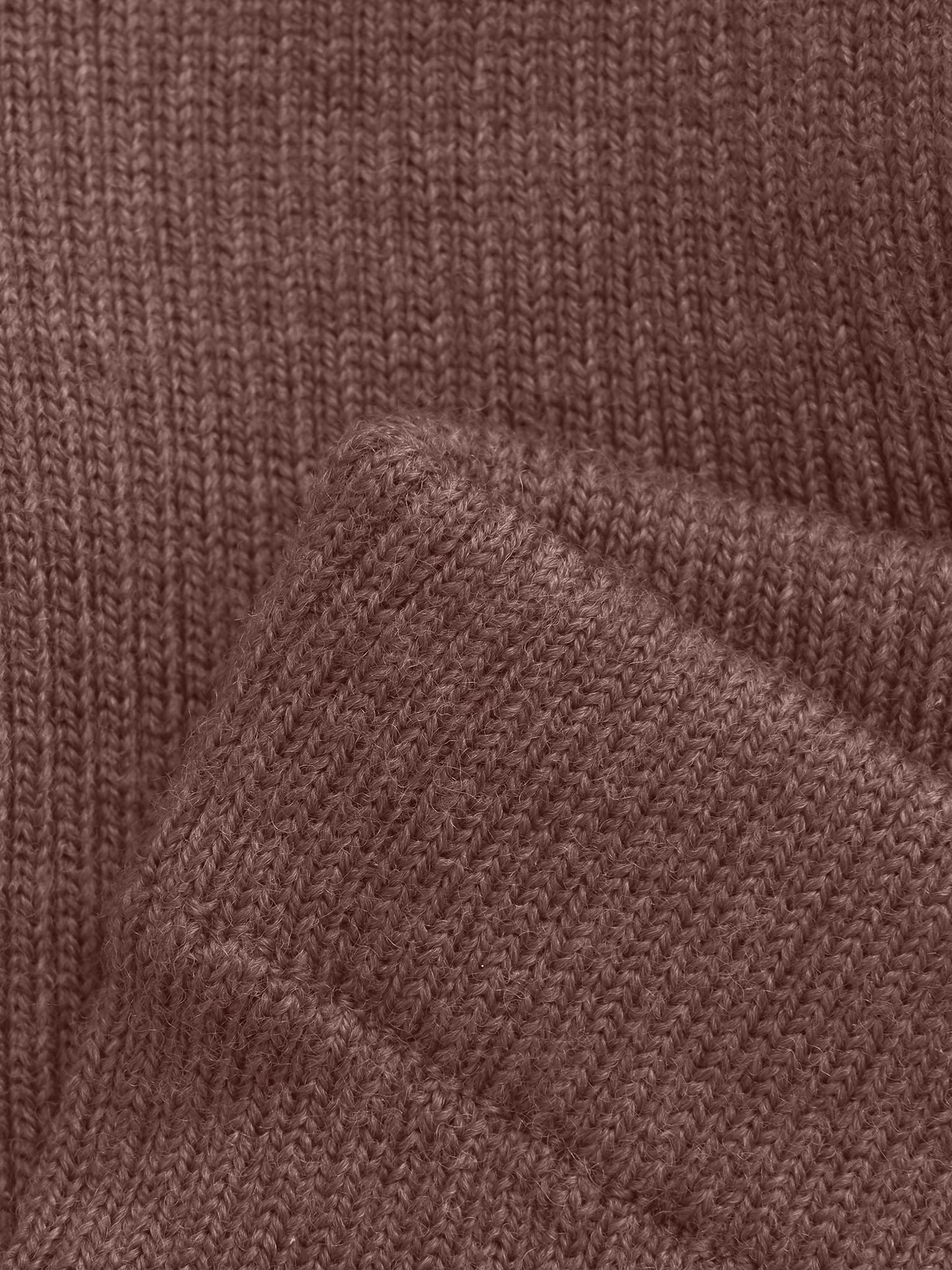 Detailansicht der feinen Strickstruktur der braunen CeLaVi Woll-Leggings – Bärechind, Winterthur, Zürich, Schweiz.