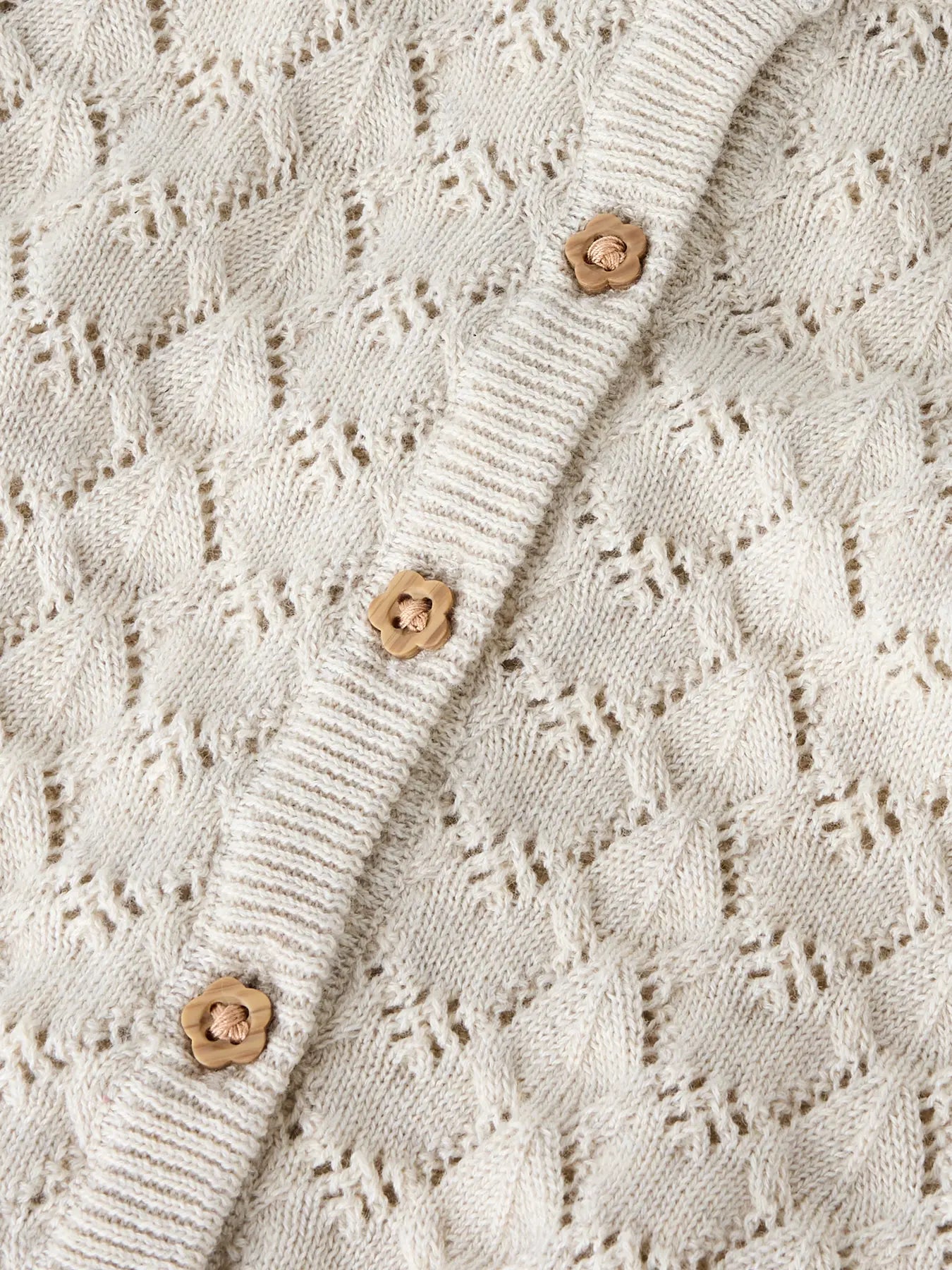 NAME IT Detail Lochmuster Strickcardigan mit Knöpfen in Beige, im Bärechind Winterthur Zürich Schweiz kaufen