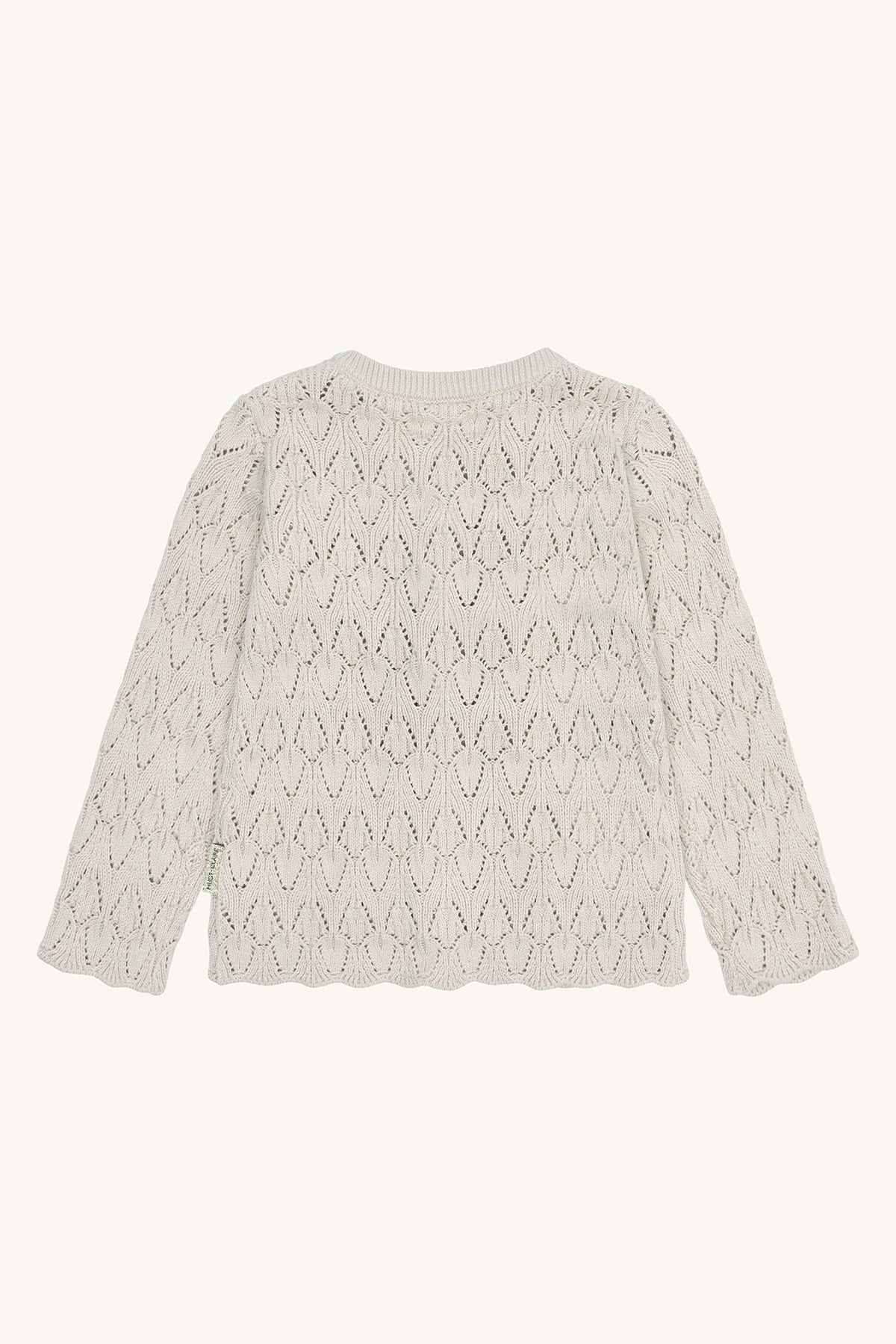 Rückansicht der Hust&Claire Bio-Baumwoll-Strickjacke in Natur – Bärechind in Winterthur, Zürich, Schweiz.