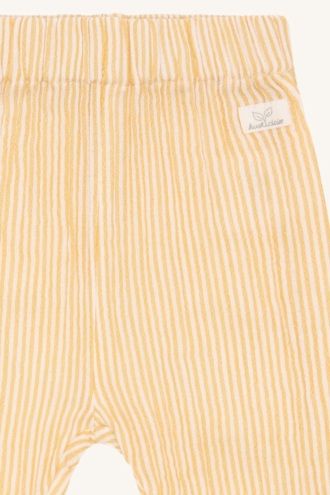 Detailansicht Hust&Claire Babyhose mit gelben Streifen im Bärechind Winterthur, Zürich, Schweiz
