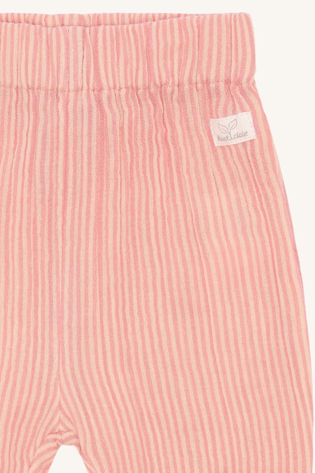 Detailansicht Hust&Claire Babyhose mit korallenfarbenen Streifen im Bärechind Winterthur, Zürich, Schweiz