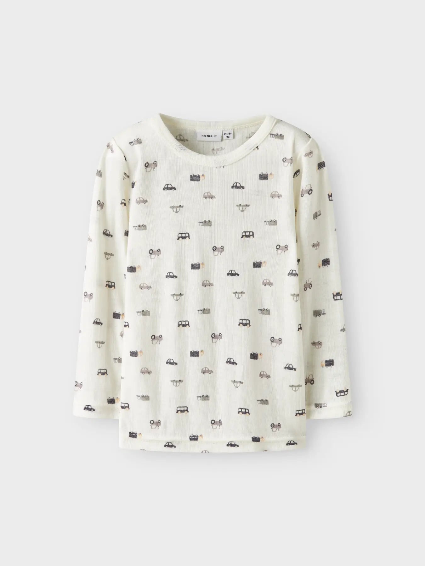 Vorderansicht eines naturfarbenen Wollshirts mit langen Ärmeln und Auto-Druck.