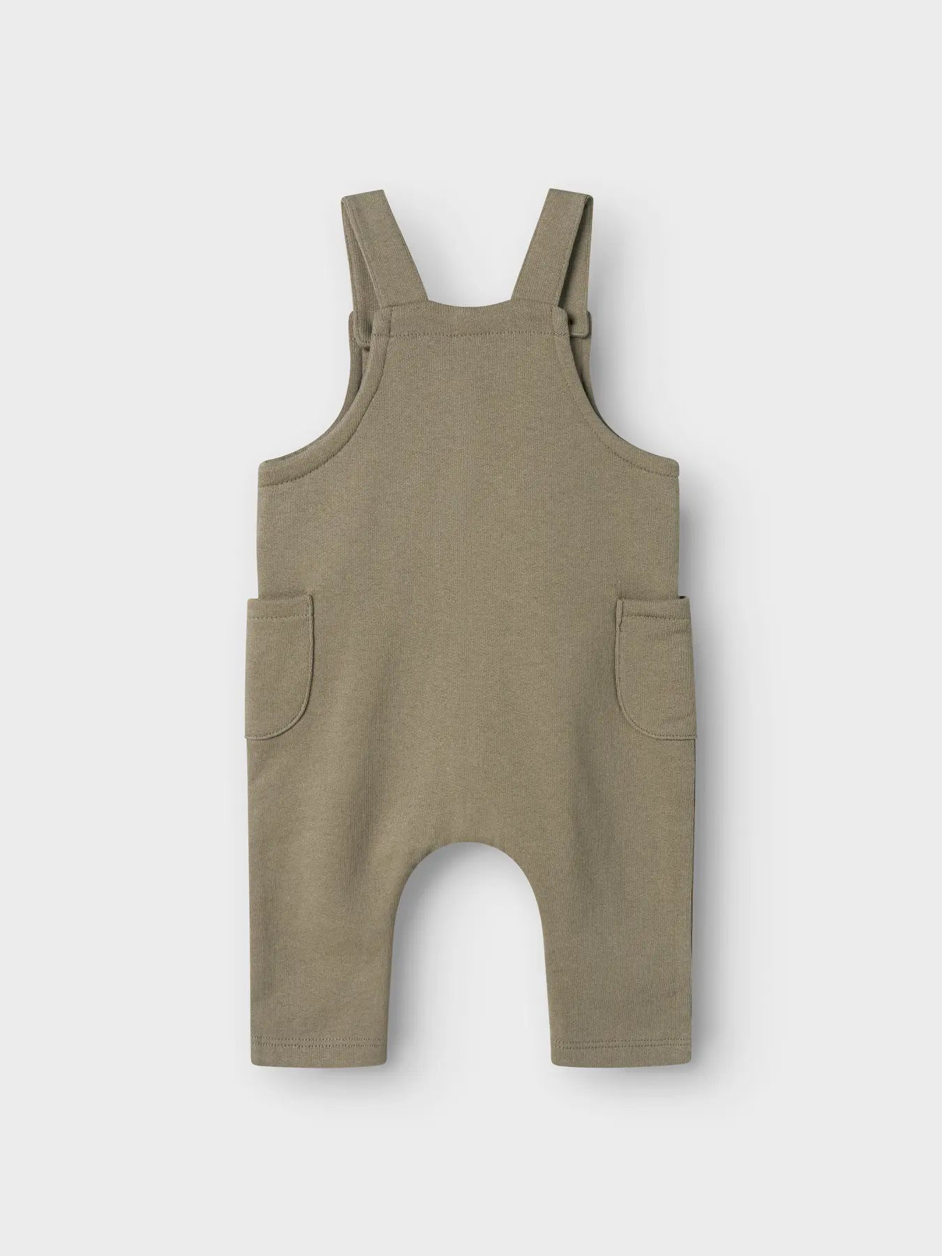 Rückseite der Lil' Atelier Latzhose mit Dino-Design aus Bio-Baumwolle – erhältlich bei Bärechind Winterthur.