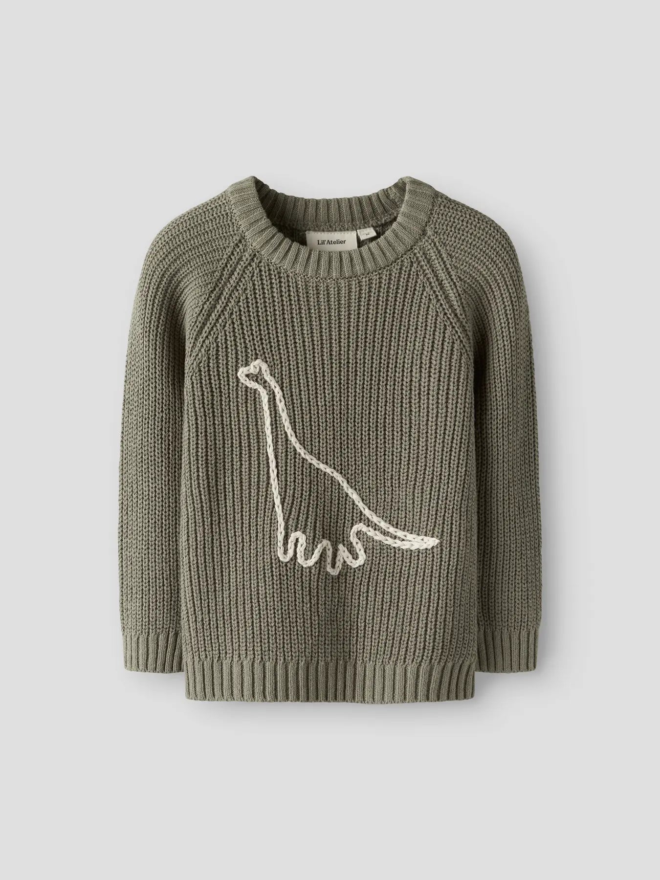 Vorderansicht des Dino-Strickpullovers von Lil'Atelier aus Bio-Baumwolle bei Bärechind in Winterthur, Zürich, Schweiz