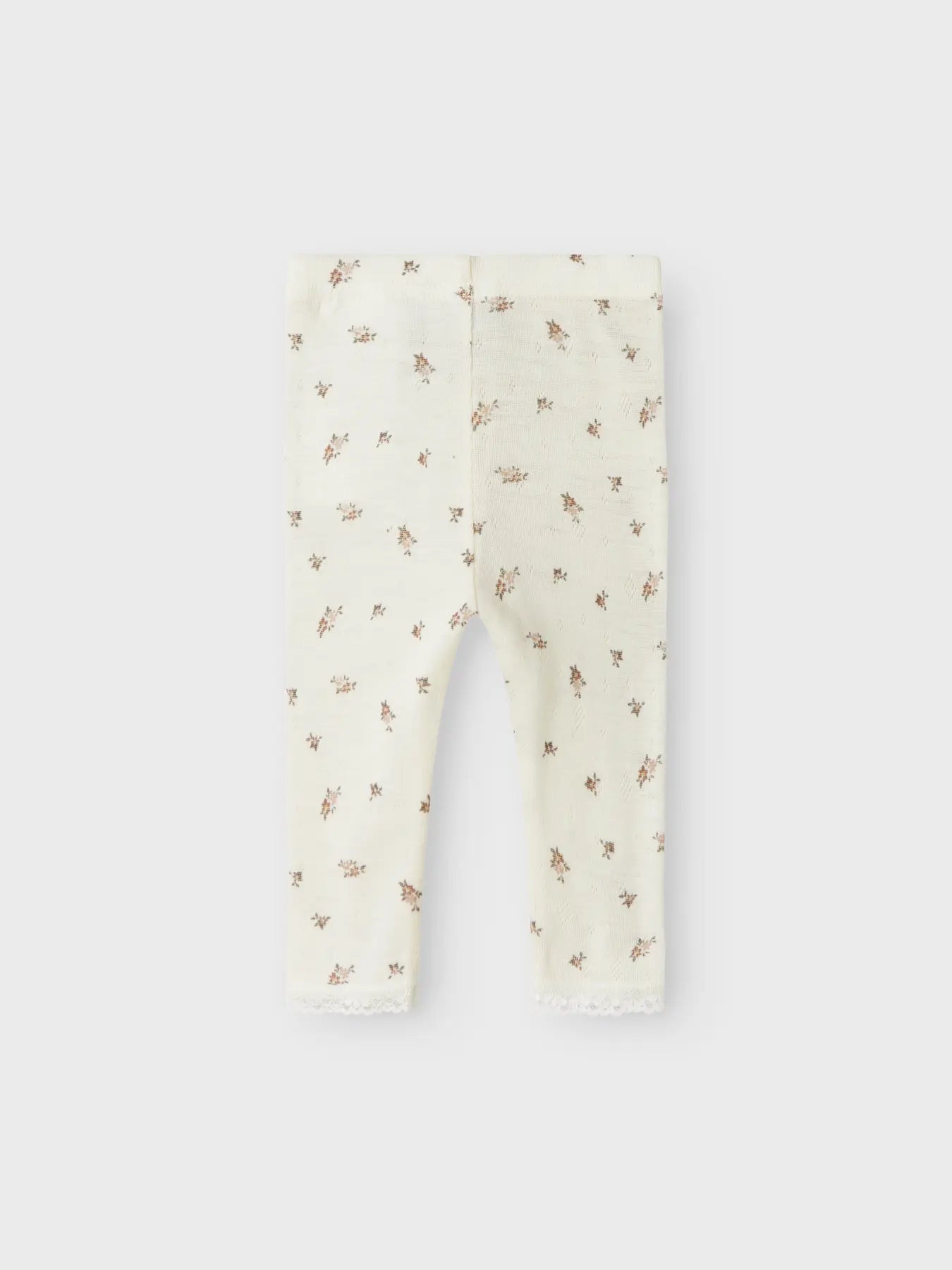 Rückansicht der Baby-Leggings von Lil'Atelier mit zartem Blümchendruck in Winterthur.