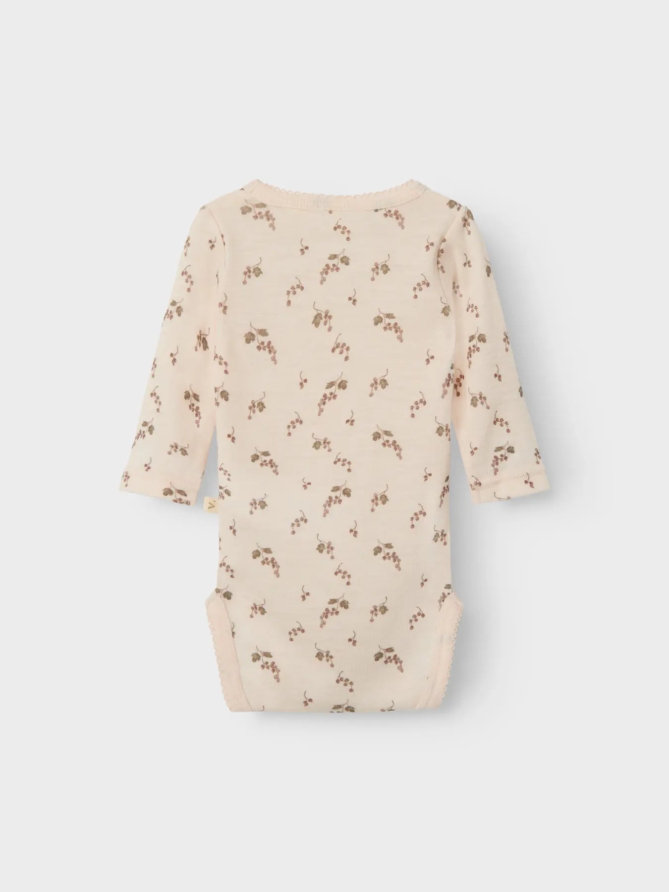 Der Babybody mit Traubenprint von Lil’Atelier aus reiner Wolle wird in Winterthur angeboten.
