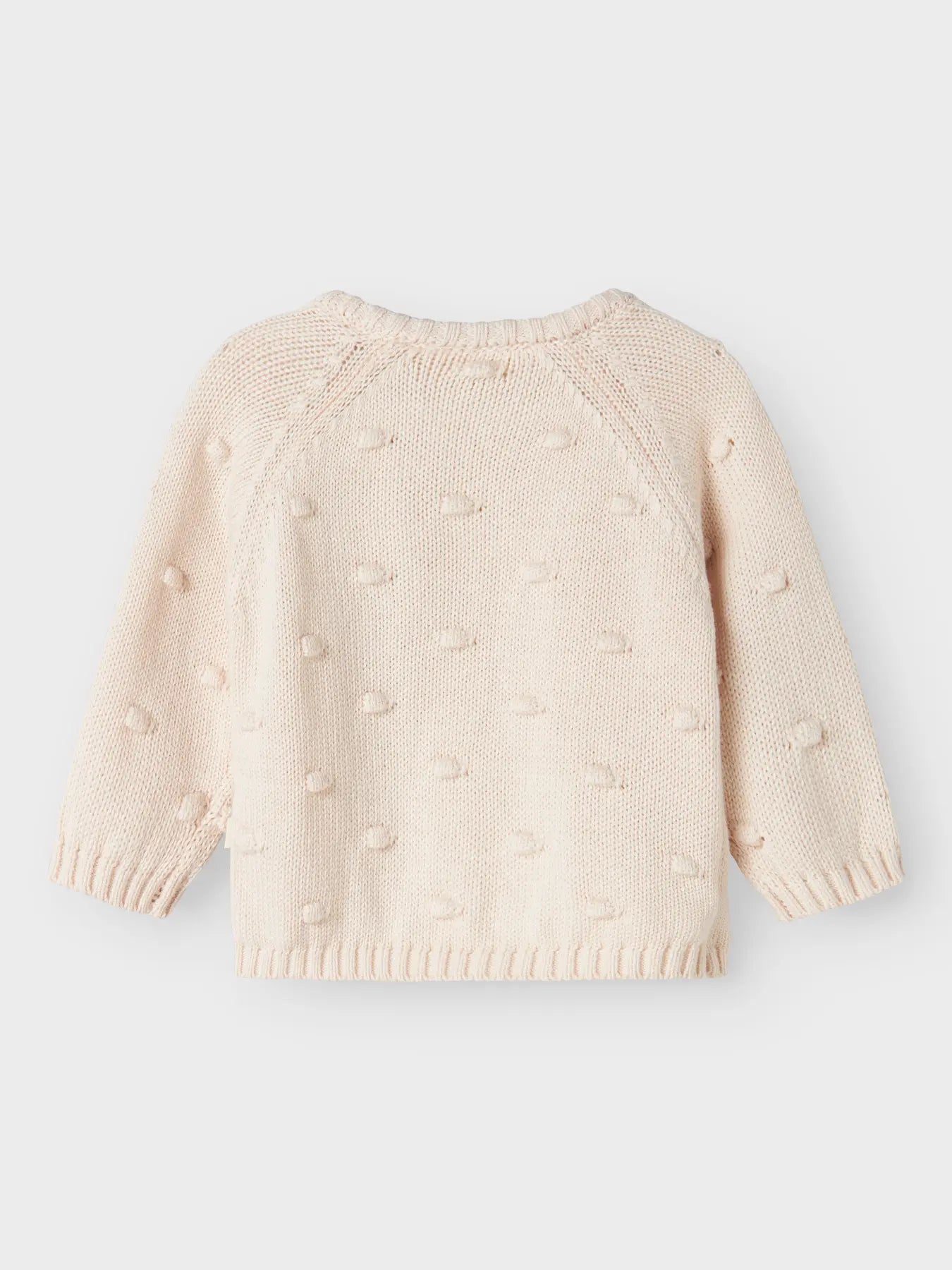 Rückansicht des naturweissen Lil'Atelier Strickpullovers aus Bio-Baumwolle – exklusiv bei Bärechind in Winterthur, Zürich, Schweiz.