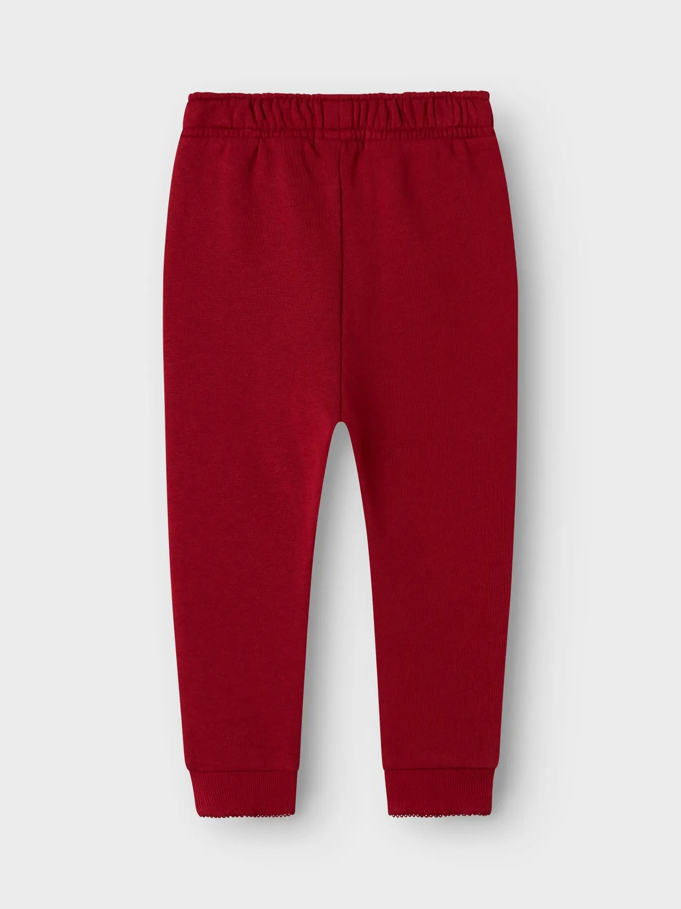 Rückseite der roten Lil'Atelier Bio-Sweathose flachliegend – Bärechind, Winterthur Zürich Schweiz.
