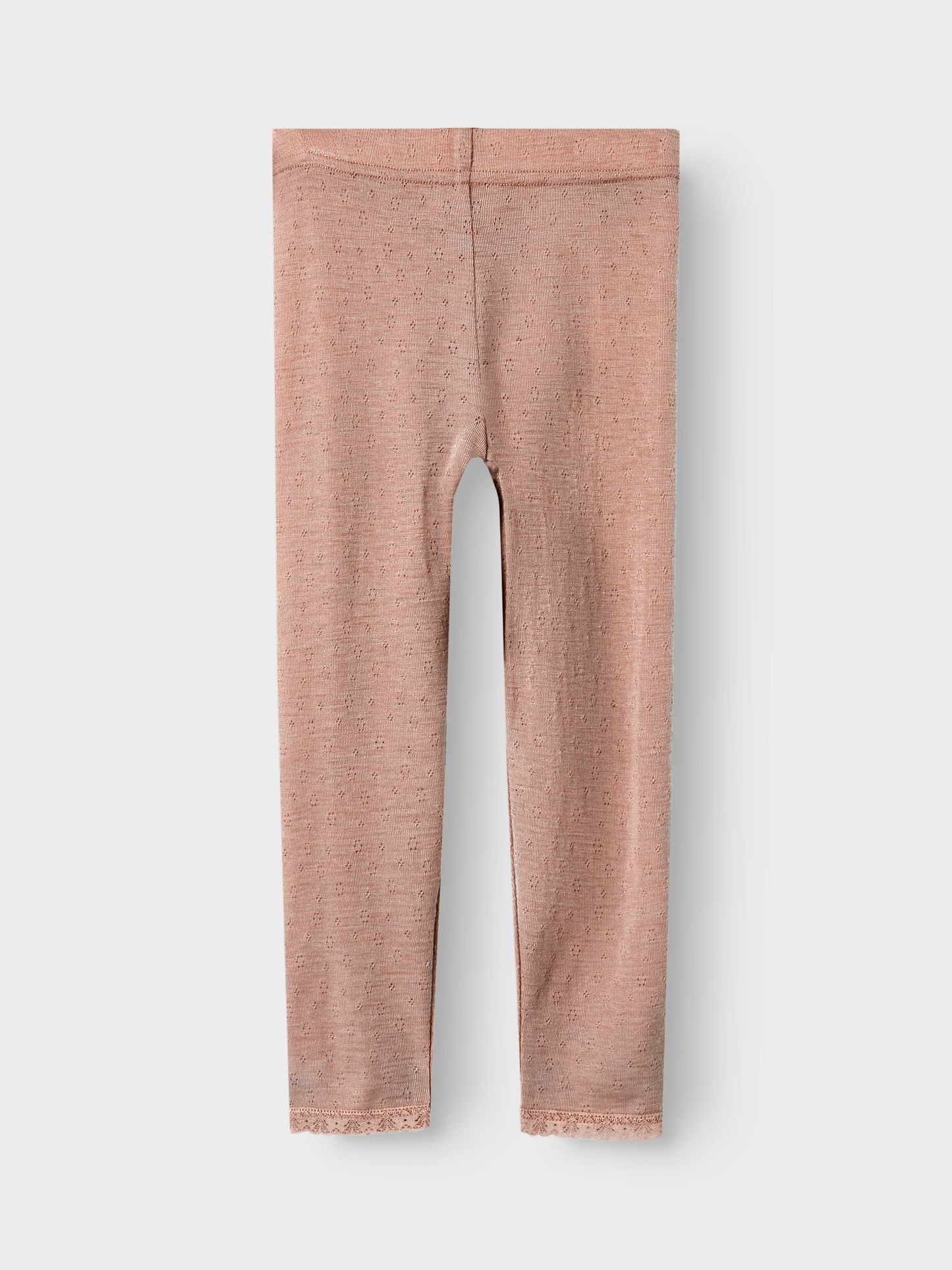 Vorderseite der Wollleggings mit Lochmuster in Rosa von Lil’Atelier – Bärechind Winterthur, Zürich, Schweiz.