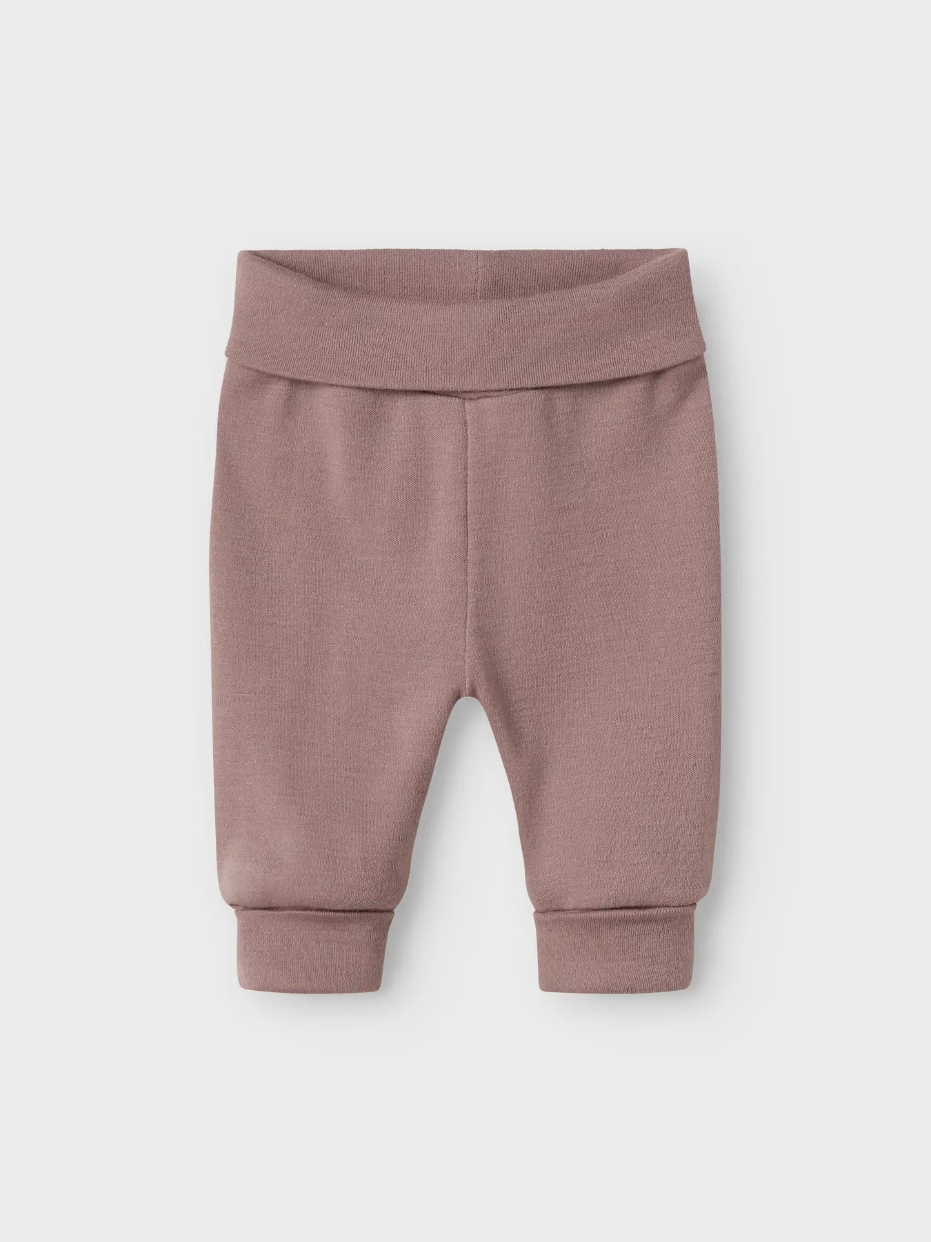 Die Name it Wollhose aus Merinowolle in Mauve ist bei Bärechind in Winterthur erhältlich. Sie bietet angenehmen Tragekomfort für Babys.