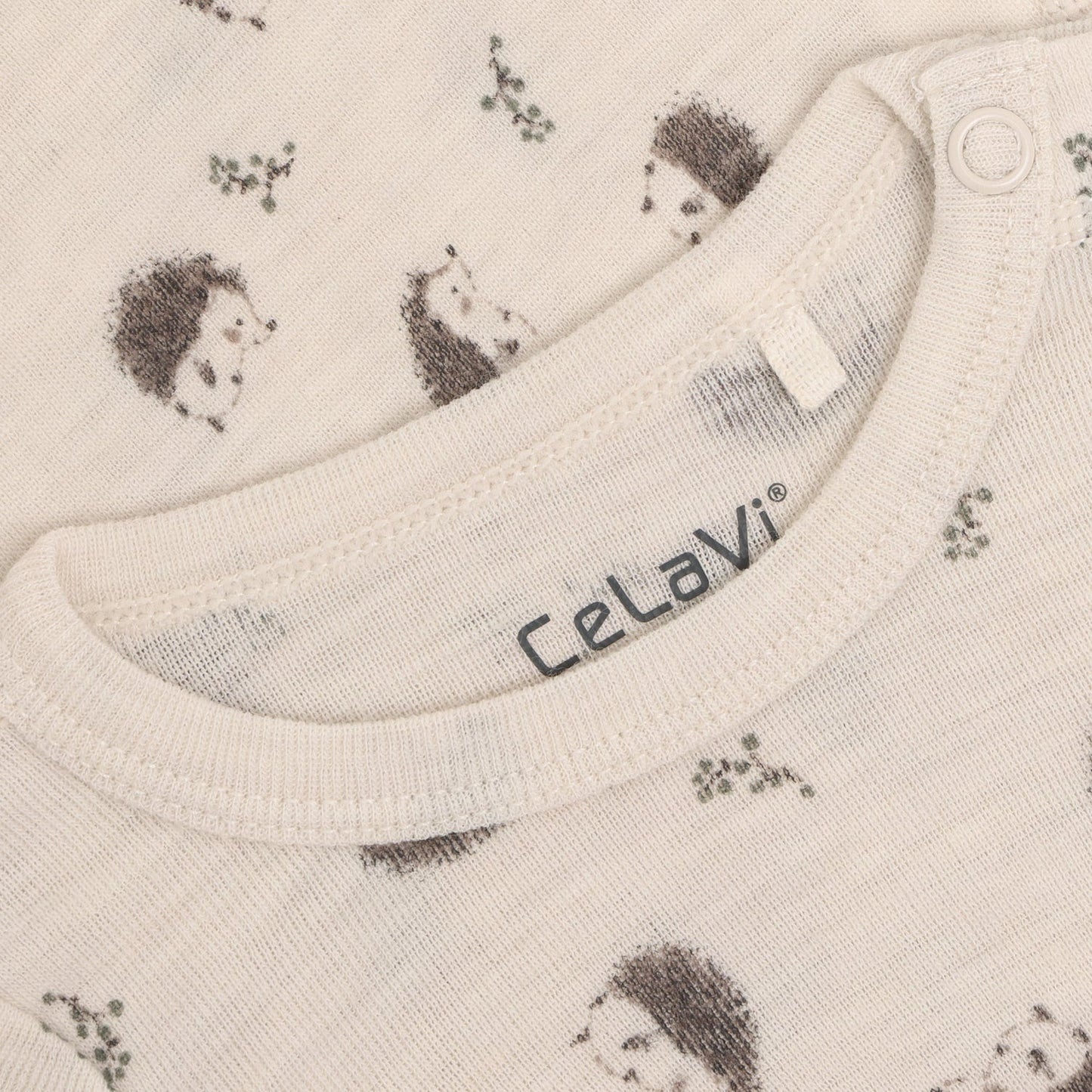 Nahaufnahme Igelprint auf Merino Body CeLaVi Walnut