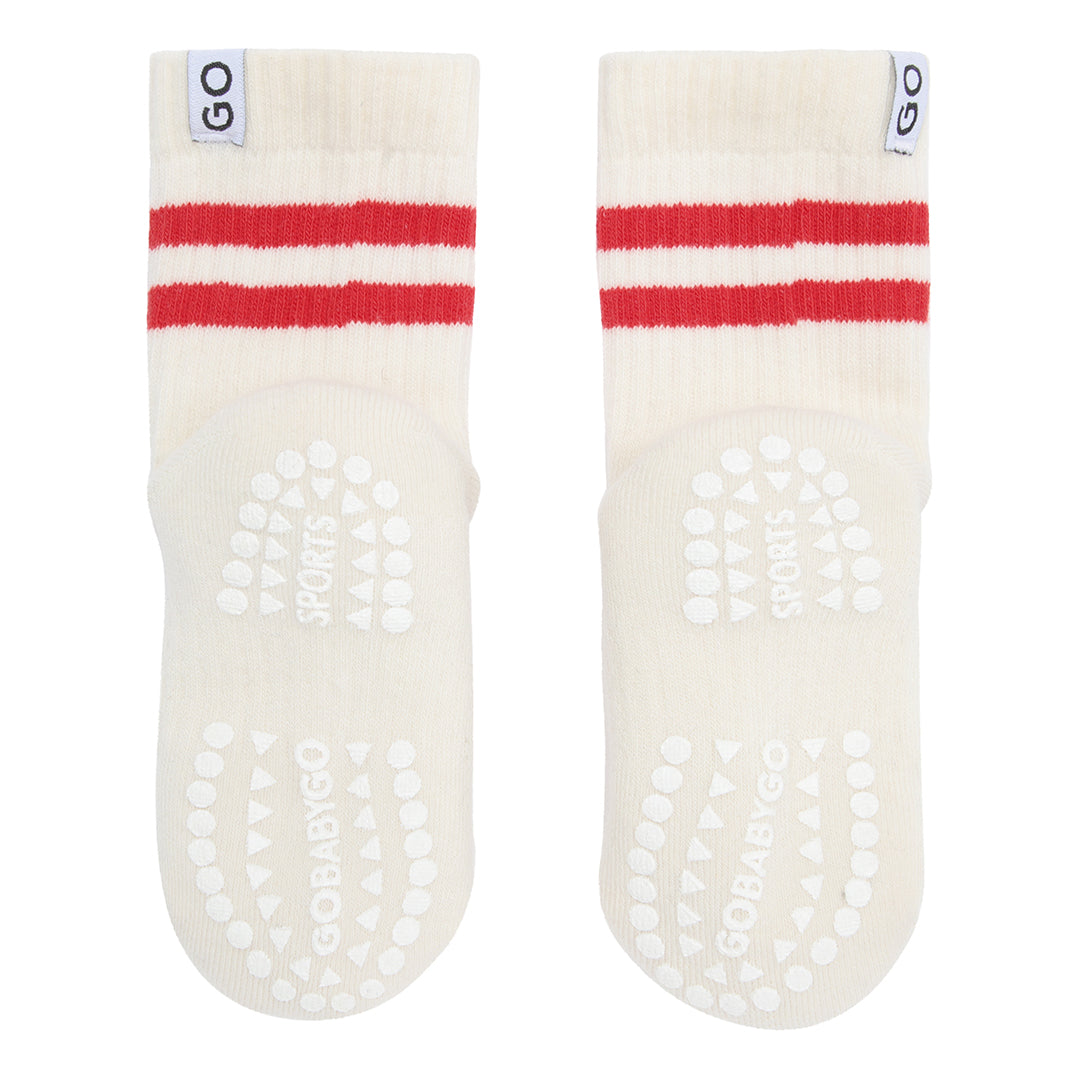 Weisse GoBabyGo Rutschsocken Sport mit roten Streifen – nachhaltig und bequem bei Bärechind Winterthur, Zürich, Schweiz.