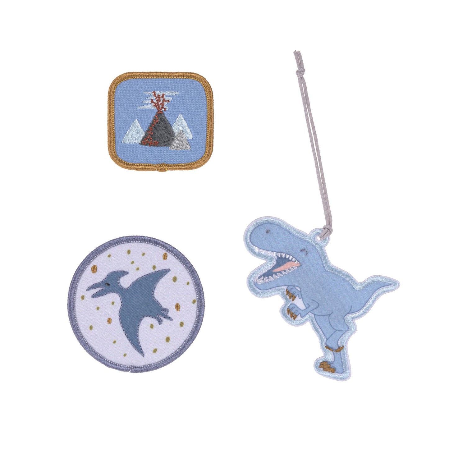 Verpackung des Laessig Patches & Anhaenger Dinosaurier Sets mit blauem Dinosaurier-Anhaenger und zwei passenden Patches.
