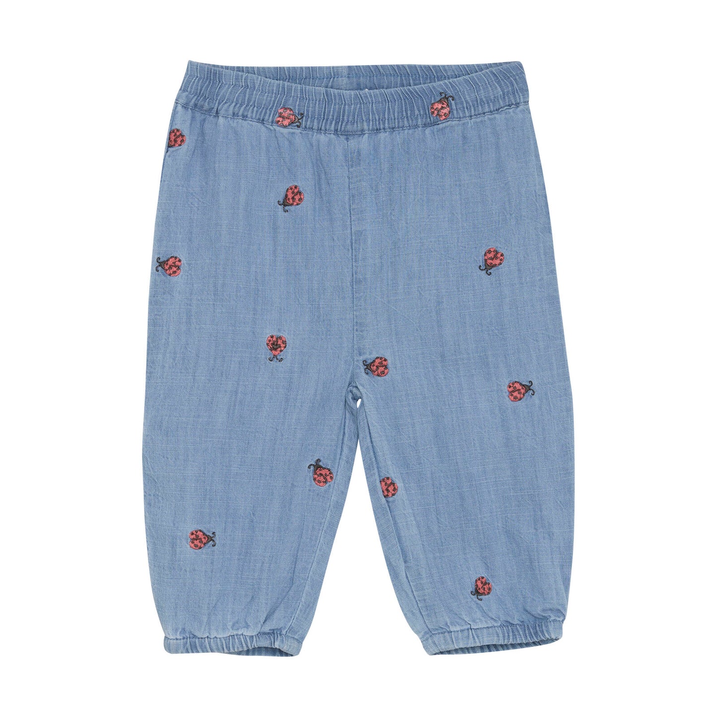 Baby-Jeans aus leichtem Denim mit süssen Marienkäfer-Stickereien und elastischem Bund, erhältlich in Winterthur, Zürich, Schweiz