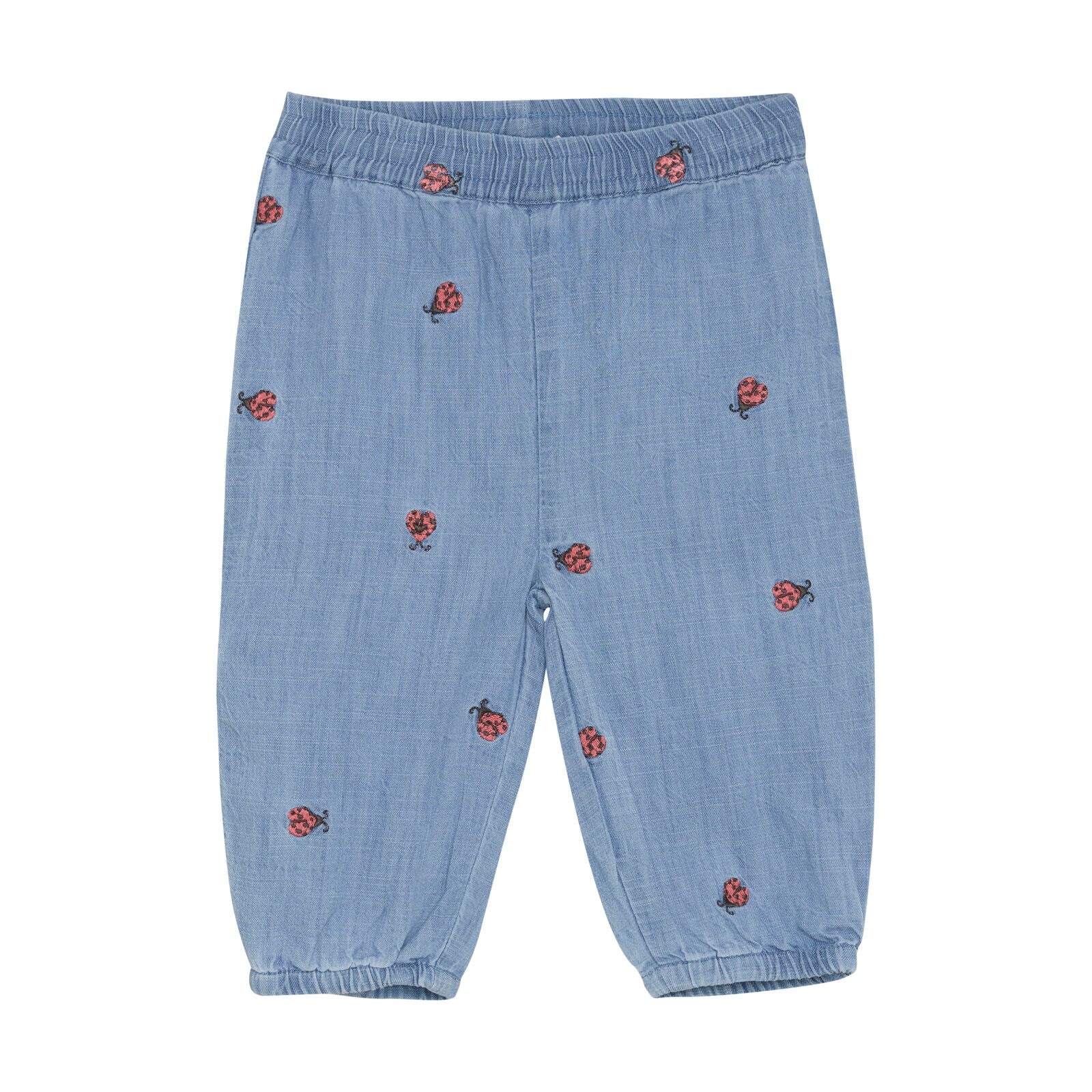 Baby-Jeans aus leichtem Denim mit süssen Marienkäfer-Stickereien und elastischem Bund, erhältlich in Winterthur, Zürich, Schweiz