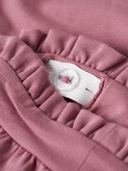 Detail Rüschenbund mit Schleife altrosa Baby Jogginghose im Bärechind Winterthur Zürich Schweiz kaufen