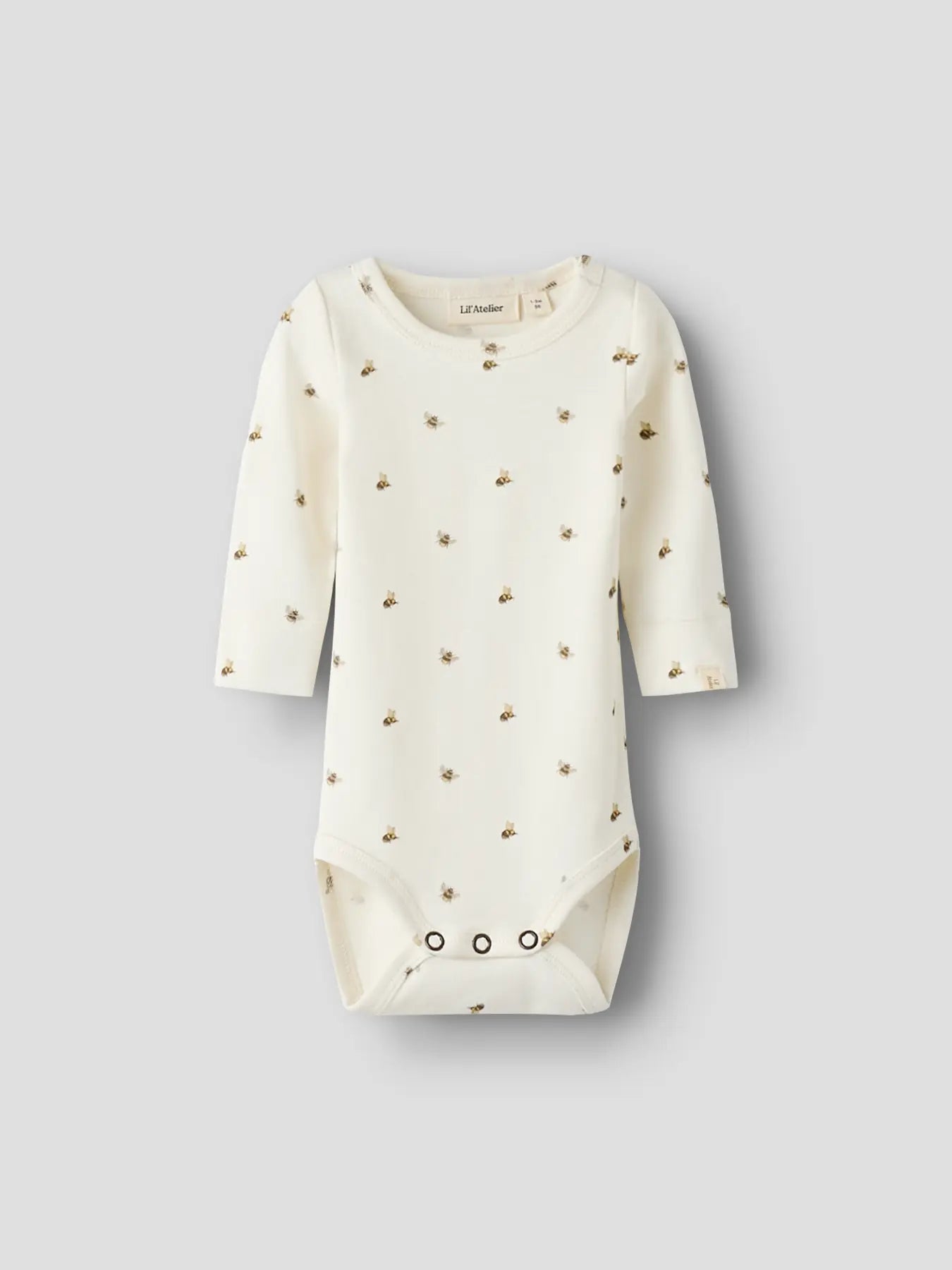Langarm Babybody mit Bienen-Print in Creme von Lil’ Atelier im Bärechind Winterthur Zürich Schweiz