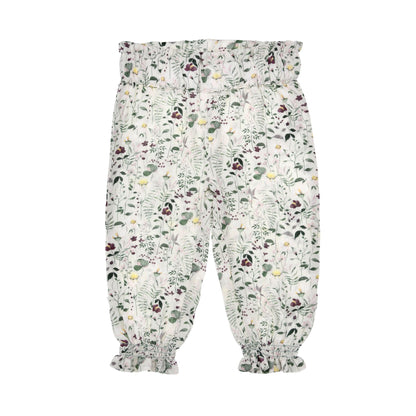 Vorderansicht der leichten Pluderhose mit Blätterprint von Bondi – erhältlich im Bärechind Kinderladen in Winterthur oder online in der Schweiz