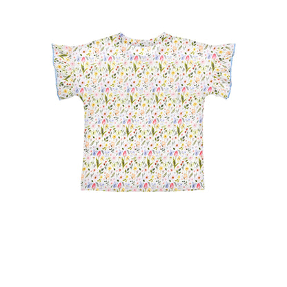 Rückenansicht des Bondi T-Shirts mit buntem Blumen-Alloverprint und Flügelärmeln – erhältlich bei Bärechind Kinderladen Schweiz
