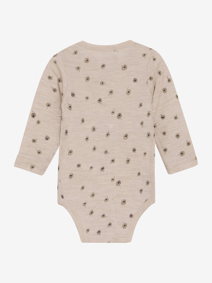CeLaVi Babybody aus feiner Wolle, rosa mit zartem Blumenmuster – im Bärechind Winterthur, Zürich Schweiz.