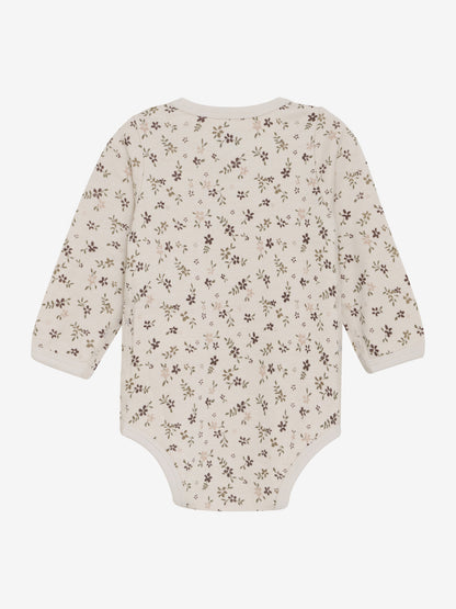 Rückseite des CeLaVi Langarmbodys mit Blumenmuster – zu kaufen im Bärechind in Winterthur, Zürich, Schweiz.