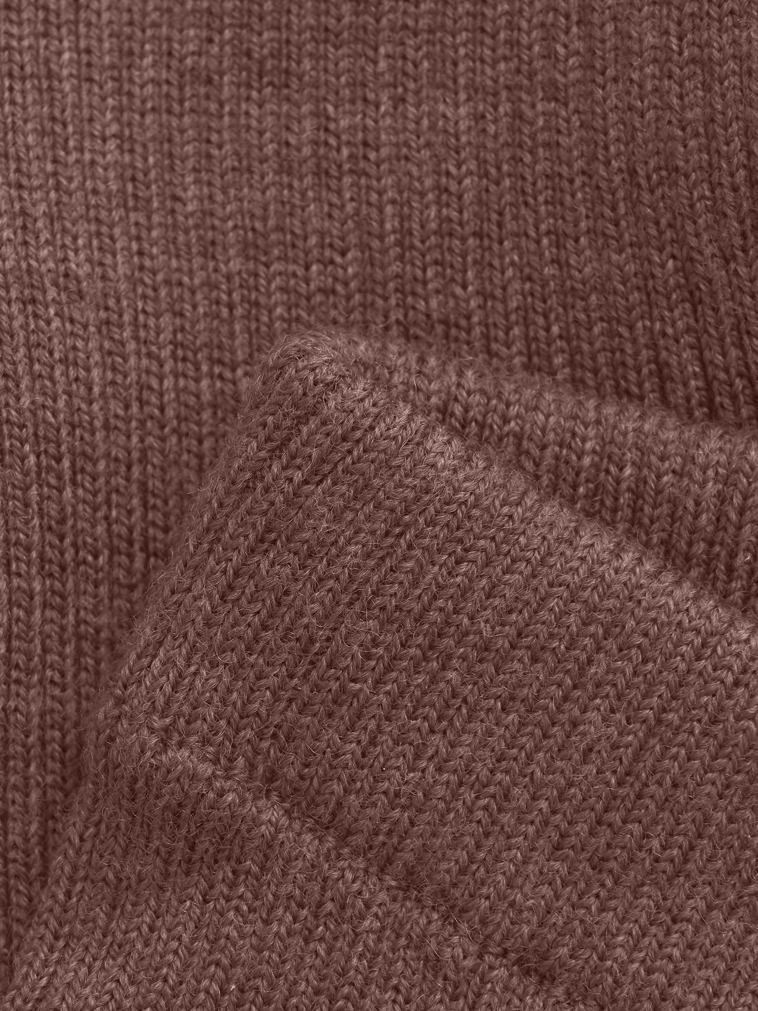 Detailansicht der feinen Strickstruktur der braunen CeLaVi Woll-Leggings – Bärechind, Winterthur, Zürich, Schweiz.