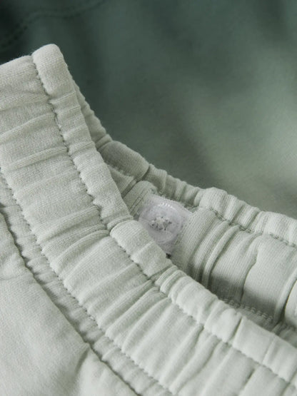 NAME IT Detail elastischer Bund grüne Sweatshorts aus Baumwolle, im Bärechind Winterthur Zürich Schweiz kaufen