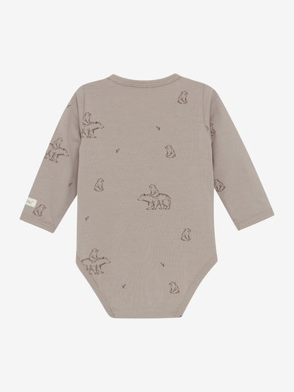 Rückseite des braunen Fixoni Wickelbodys aus Bio-Baumwolle – erhältlich im Bärechind in Winterthur, Zürich, Schweiz