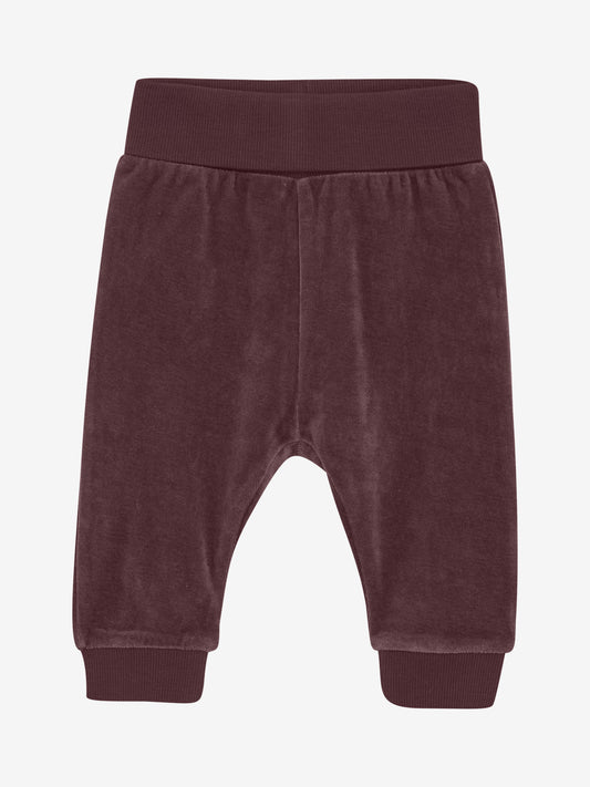 Fixoni Babyhose aus braunem Velours – nachhaltig & bequem, erhältlich bei Bärechind in Winterthur, Zürich, Schweiz