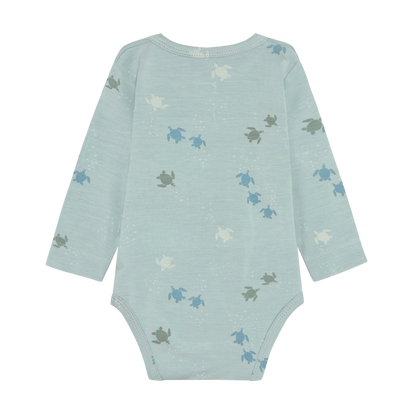 Fixoni Bambus Body mit Schildkröten Print als nachhaltige Babykleider im Kinderladen Bärechind Winterthur Zürich Schweiz.