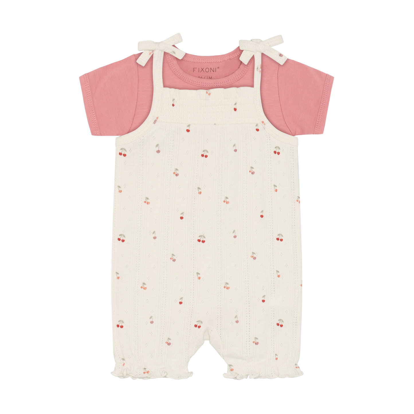 Fixoni Body und Strampler mit Kirschen aus Bio Baumwolle im Kinderladen Bärechind Winterthur Zürich Schweiz für nachhaltige Kinderkleider.