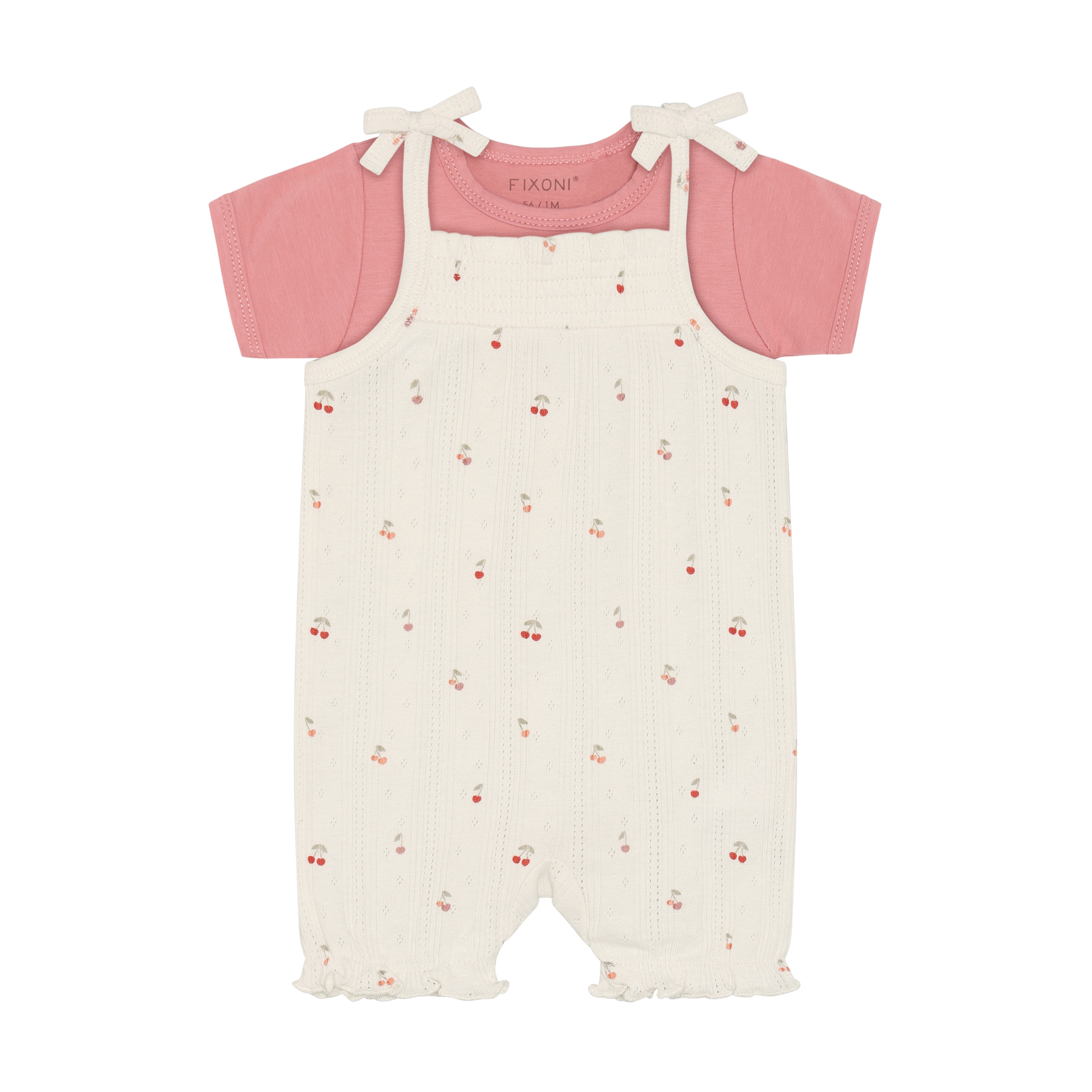 Fixoni Body und Strampler mit Kirschen aus Bio Baumwolle im Kinderladen Bärechind Winterthur Zürich Schweiz für nachhaltige Kinderkleider.