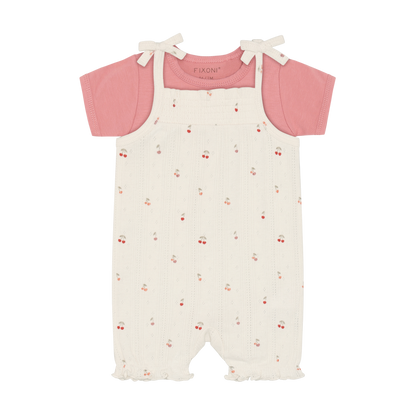 Fixoni Body und Strampler mit Kirschen aus Bio Baumwolle im Kinderladen Bärechind Winterthur Zürich Schweiz für nachhaltige Kinderkleider.