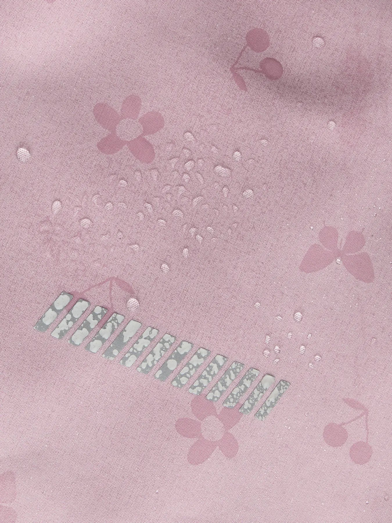 Magic Print Detail der Funktionsjacke Sunlit Allium für Kinder im Bärechind Winterthur Zürich Schweiz