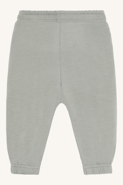 Rückansicht der Gubi Baby Jogginghose aus Bambus Viskose in Grün