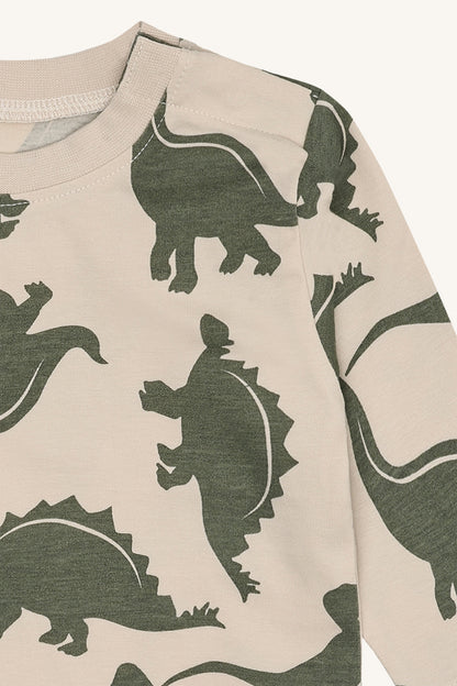 Detailaufnahme des Dino-Musters auf dem Anton Pullover von Hust & Claire, erhältlich bei Bärechind in Winterthur, Zürich Schweiz.