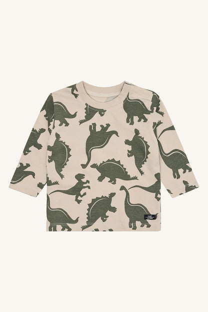Beiger Baumwollpullover mit grünen Dinosauriern von Hust & Claire, erhältlich bei Bärechind in Winterthur, Zürich Schweiz.