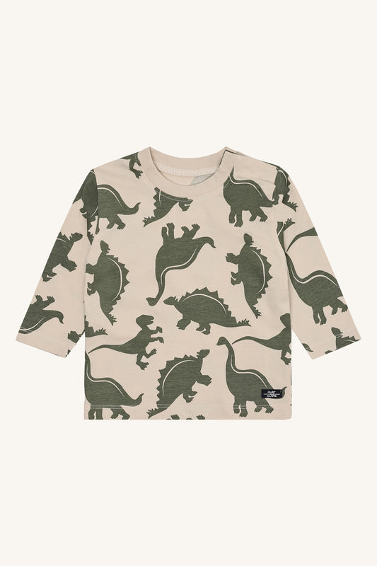 Beiger Baumwollpullover mit grünen Dinosauriern von Hust & Claire, erhältlich bei Bärechind in Winterthur, Zürich Schweiz.