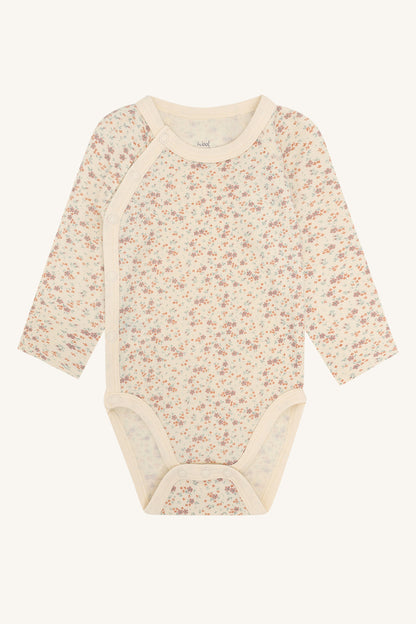 Baloo Merino/Bambus Wickelbody mit Blumenprint in Off White, Vorderansicht