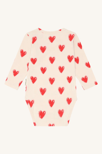 Rückansicht vom Hust&Claire Baumwollbody Bri mit Herzmuster bei Bärechind Winterthur Zürich Schweiz.