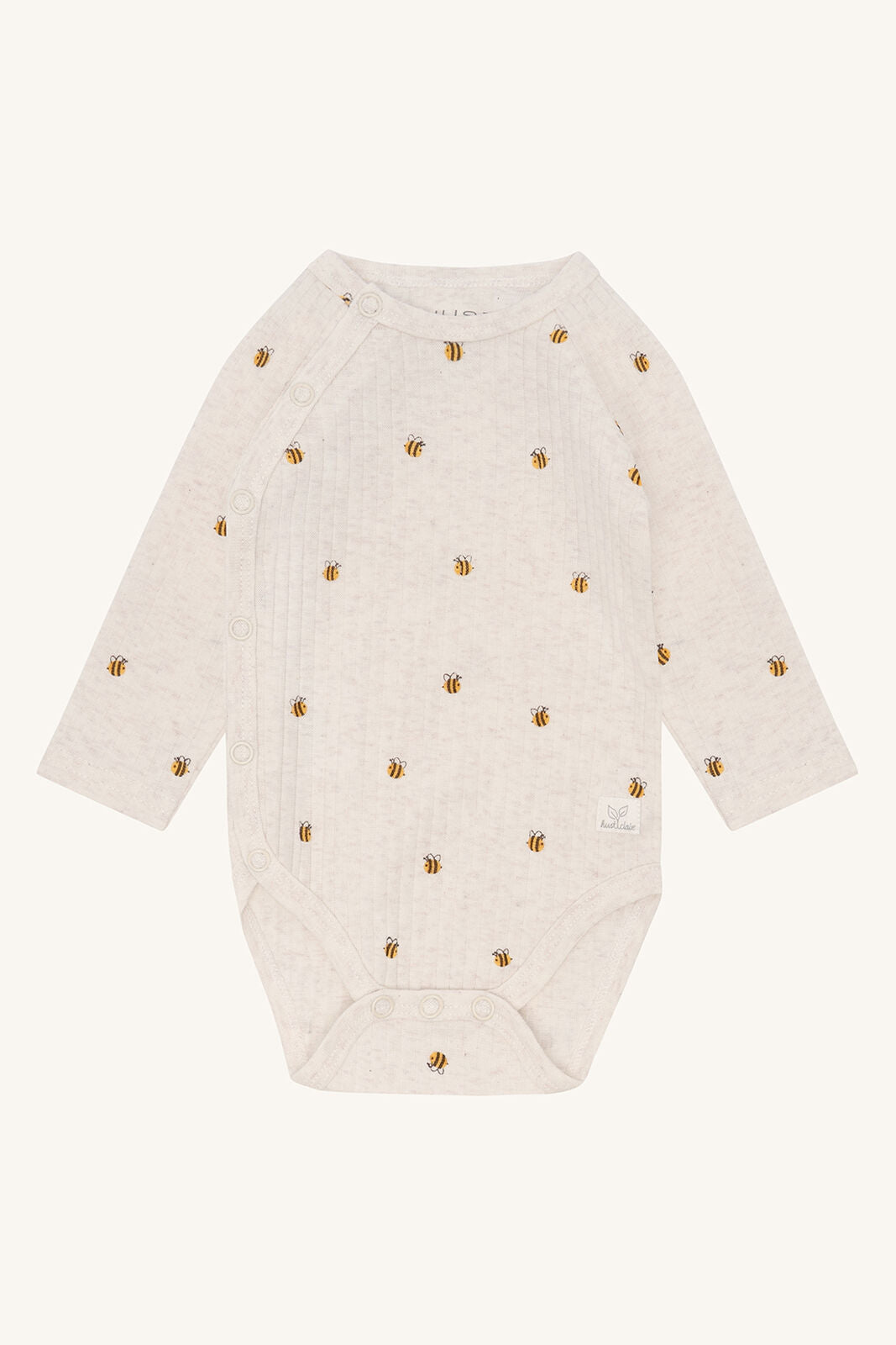 Hust&Claire Bing Wickelbody aus GOTS zertifizierter Baumwolle mit Bienenprint, Vorderansicht, im Bärechind Winterthur Zürich Schweiz.