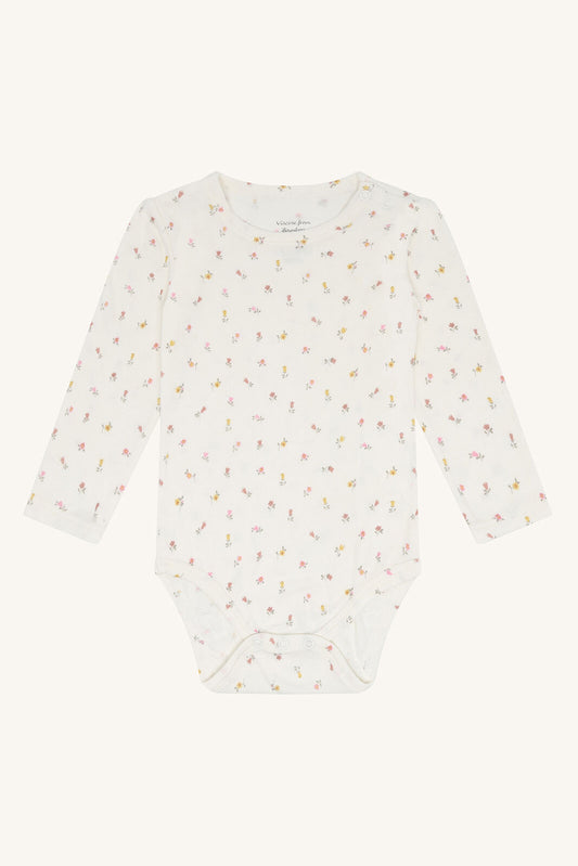Hust & Claire Buller Bambus Body in Weiss mit Blumenmuster für Babys bei Bärechind in Winterthur, Zürich, Schweiz.
