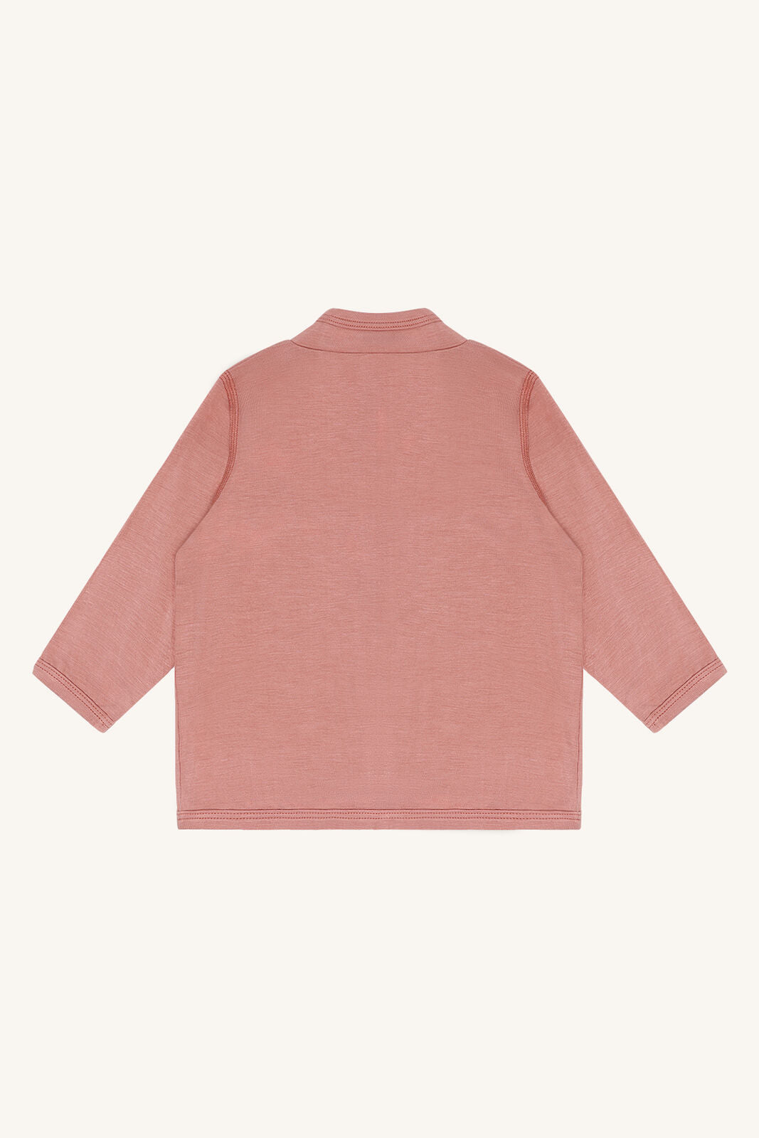 Rückseite des Hust & Claire Curd Bambus Jäckchens in Old Rose bei Bärechind Winterthur, Zürich, Schweiz.