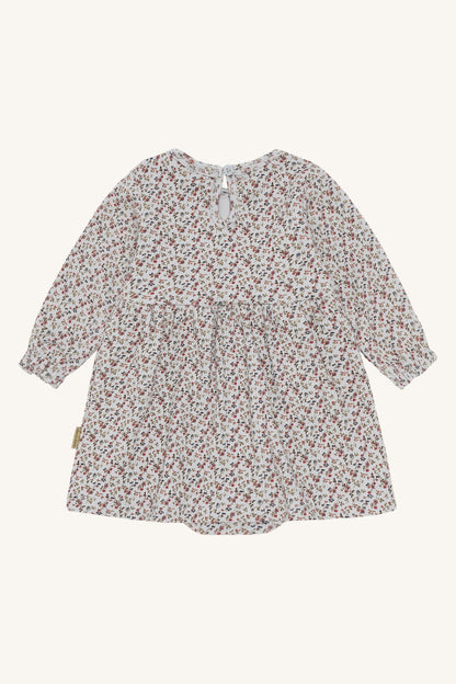 Rückansicht des Hust&Claire Kleids Kristi in Hellblau mit Blumenmuster, erhältlich im Bärechind Winterthur, Zürich Schweiz