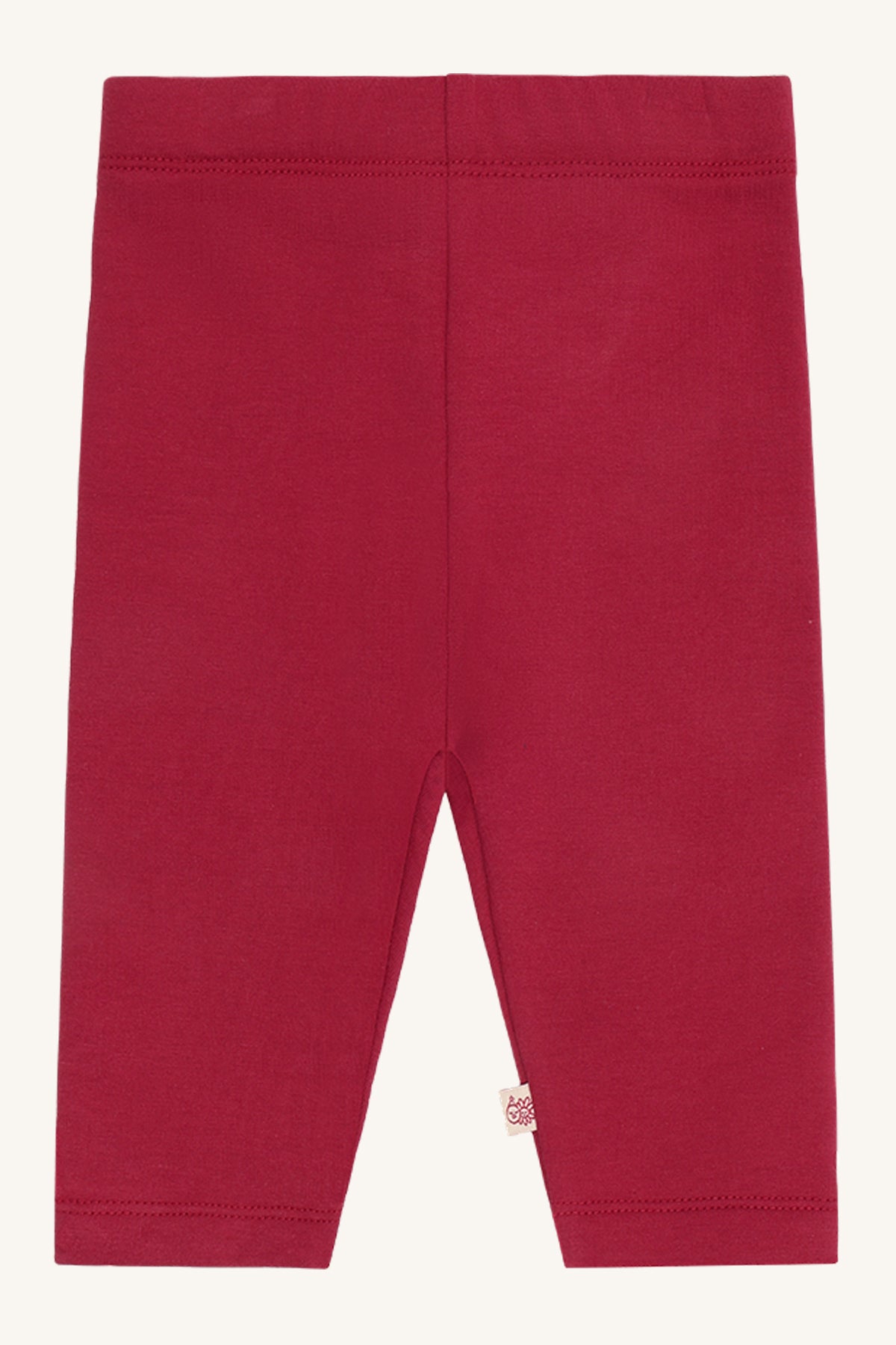 Vorderansicht der Hust & Claire Lisa Leggings in kräftigem Beerenton mit elastischem Bund. Babyhose im Bärechind Winterthur, Zürich, Schweiz.