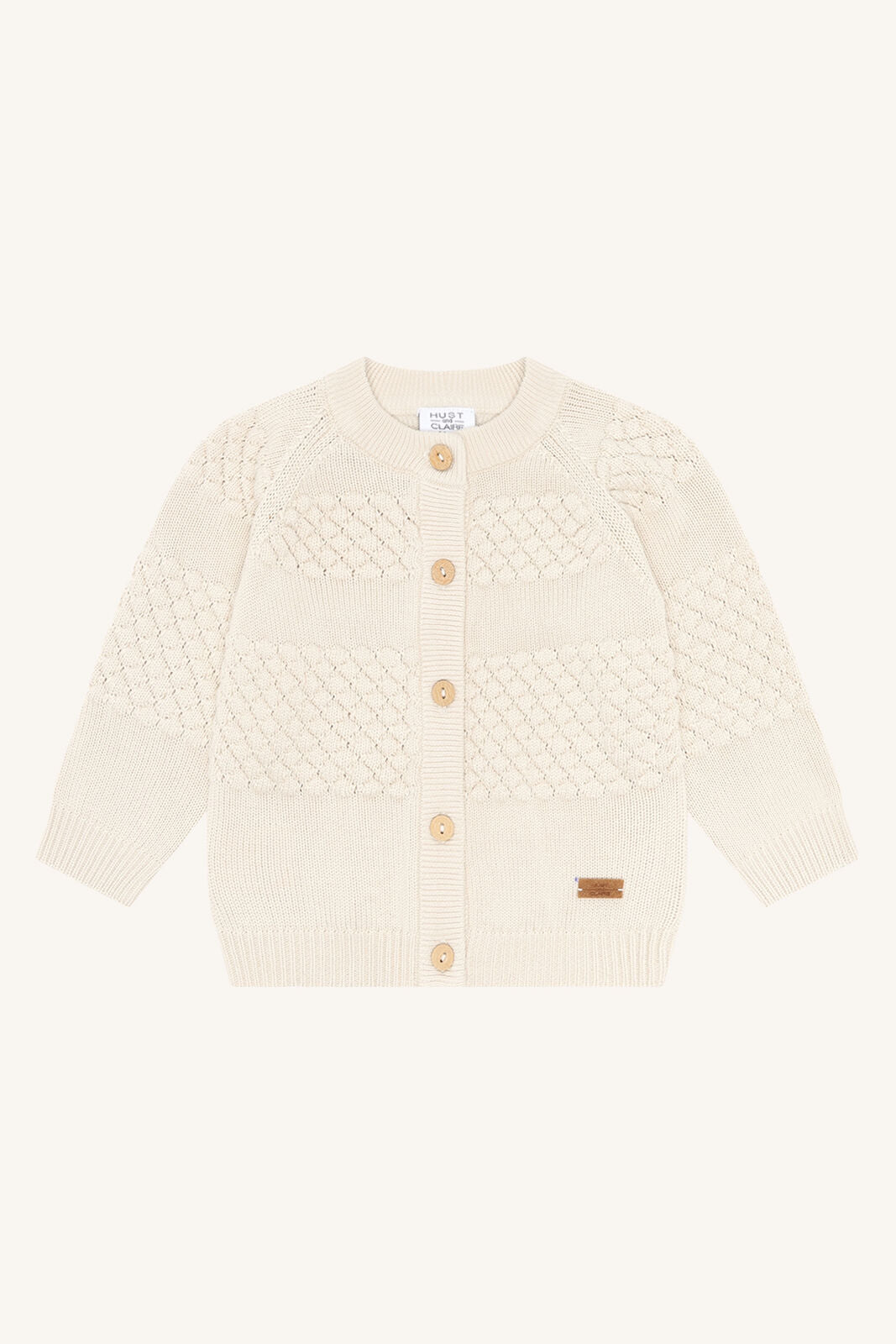 Hust&Claire Strickjäckchen aus Baumwolle in Creme – nachhaltige Babymode bei Bärechind in Winterthur, Zürich, Schweiz