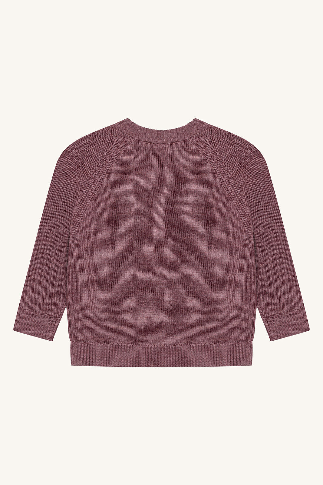 Rückansicht des Hust&Claire Curi Wollstrick Jäckchens aus 100% Wolle bei Bärechind Winterthur, Zürich, Schweiz.