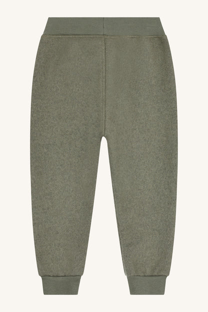Hust&Claire Wollwalkhose in Grün flachliegend – nachhaltige Schurwolle bei Bärechind Winterthur Zürich Schweiz.
