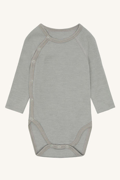 Hust&Claire Wollbody in Grau – weiche Merinowolle für Babys, erhältlich bei Bärechind Winterthur Zürich Schwei