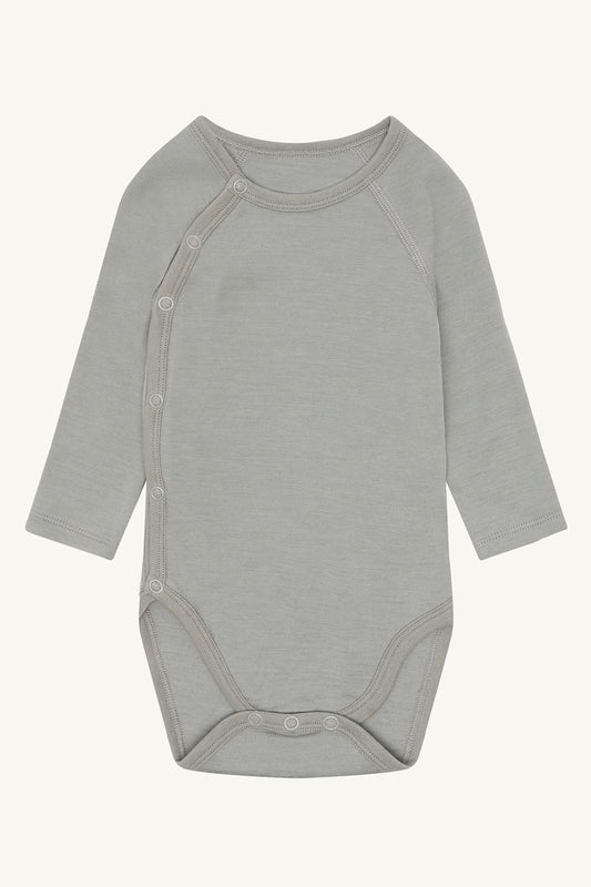 Hust&Claire Wollbody in Grau – weiche Merinowolle für Babys, erhältlich bei Bärechind Winterthur Zürich Schwei